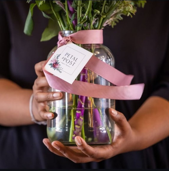Single weekly posy in a glass jar from Petal & Post