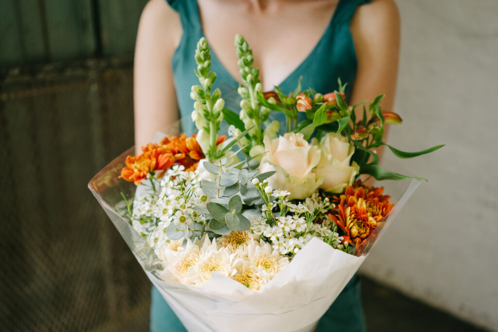 Morning light on a fresh Petal & Post seasonal flower arrangement